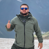 Гид Хасан